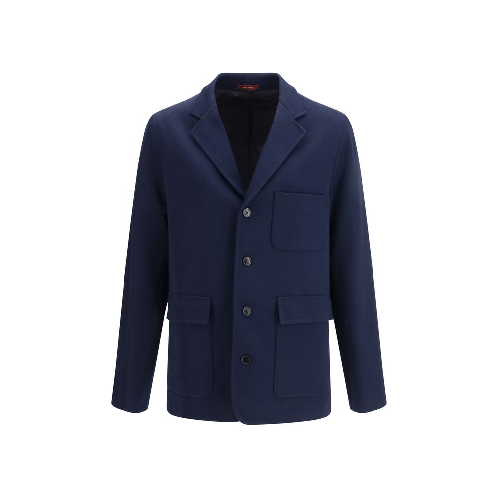 Veste Gucci en coton bleu, coupe longue, avec détails élégants, portée sur un mannequin.