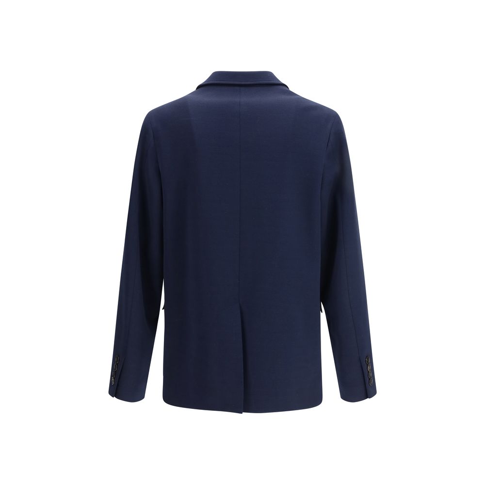 Veste longue en coton bleu de Gucci avec logo, vue de face, mode élégante et sophistiquée, détail de la veste visible.