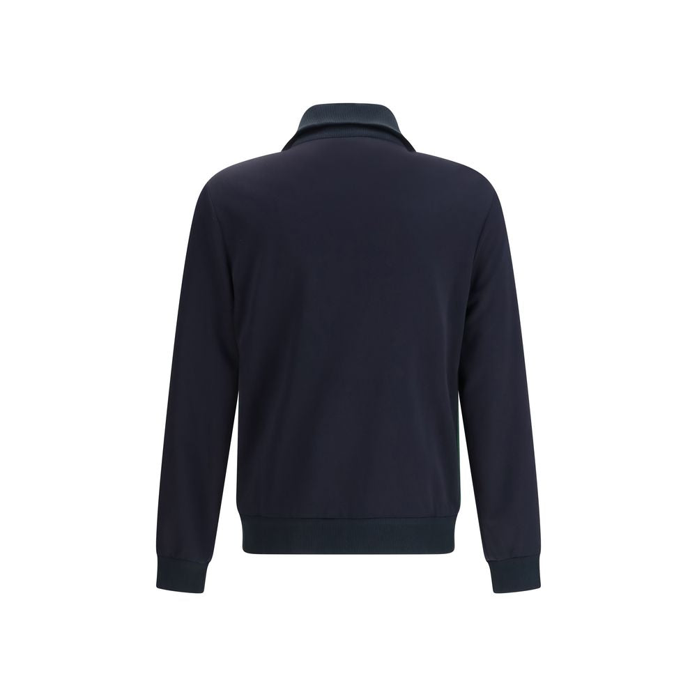 Veste coupe-vent en polyester bleu de Gucci, vue de face avec capuche et fermeture éclair.