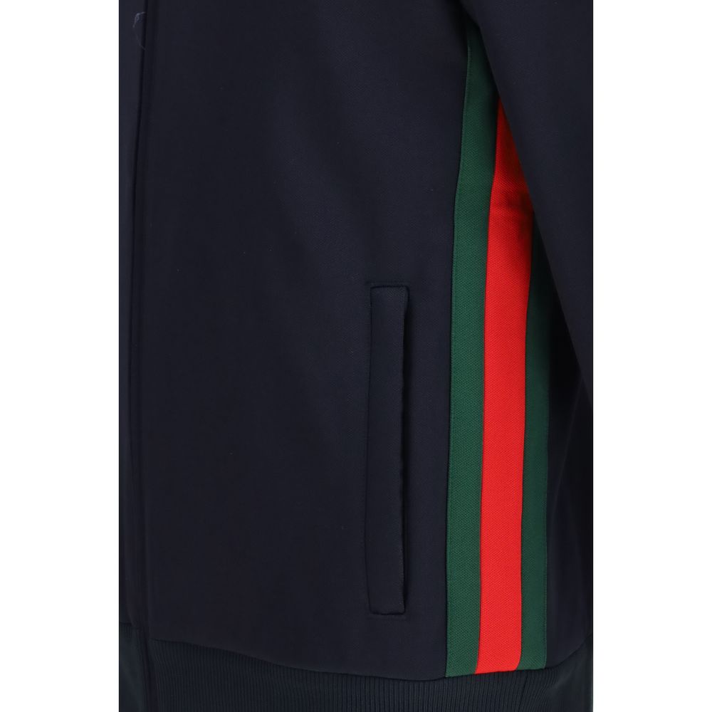 Veste en polyester bleu Gucci, coupe moderne, détails élégants, vue de face sur veste de shell en polyester.