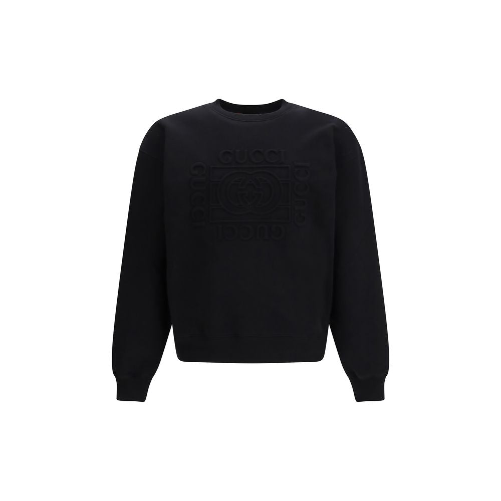 Sweat-shirt en coton noir Gucci, coupe décontractée avec logo Gucci visible à l'avant, pour homme ou femme.