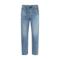 Jeans slim en coton bleu Gucci, coupe ajustée, visible avec détails de couture et logo discret sur la poche arrière.