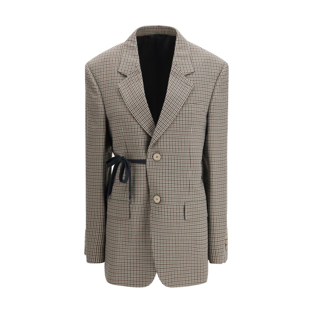 Manteau Balenciaga en lyocell multicolore avec coupe élégante et détails modernes, présenté sur un fond neutre.
