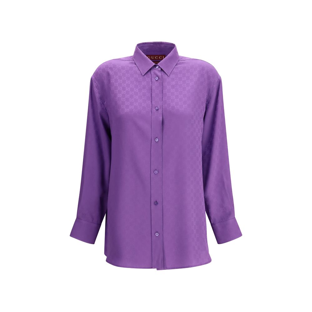 Chemise en soie violette Gucci, vue de face, détails élégants, col classique et manches longues, tissu fluide et luxueux.