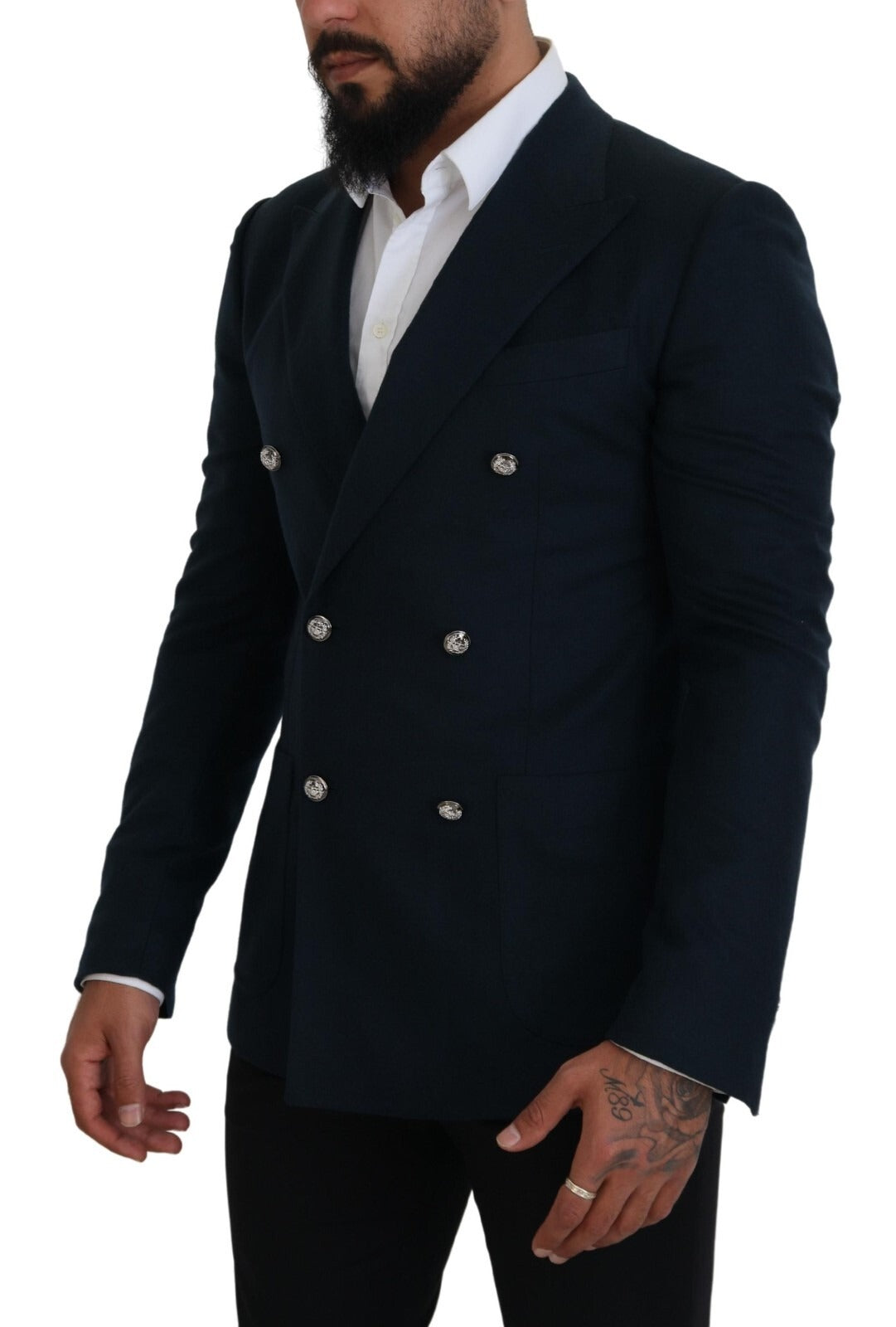 Manteau formel bleu à double boutonnage de Dolce & Gabbana, blazer élégant avec col revers et poches avant.
