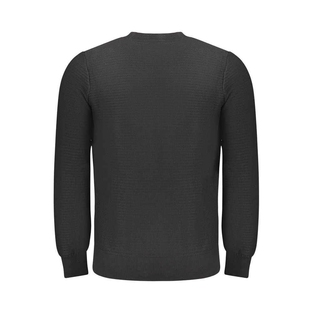 Pull homme Hugo Boss en coton noir, style classique, avec col rond et finition soignée, idéal pour un look élégant et décontracté.