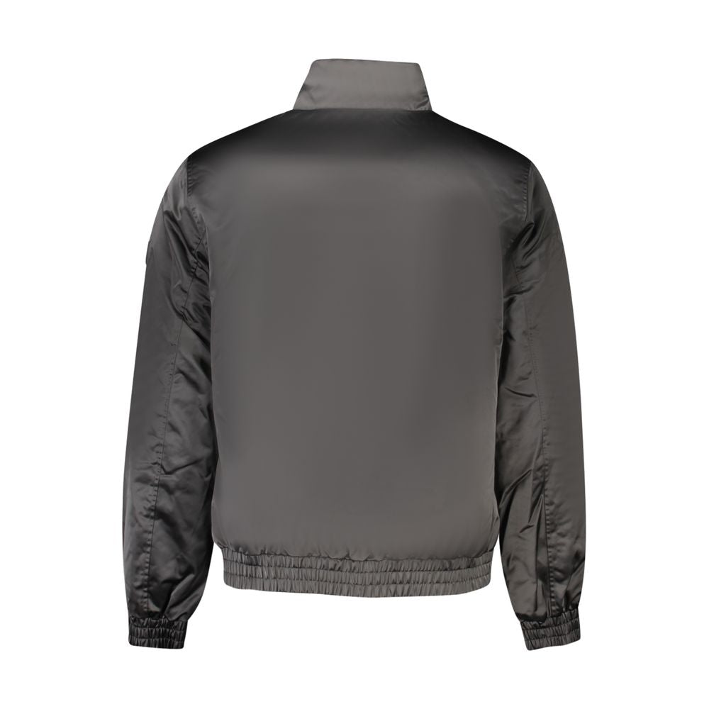 Veste pour homme en polyester noire de la marque Calvin Klein, fermeture éclair et design élégant.