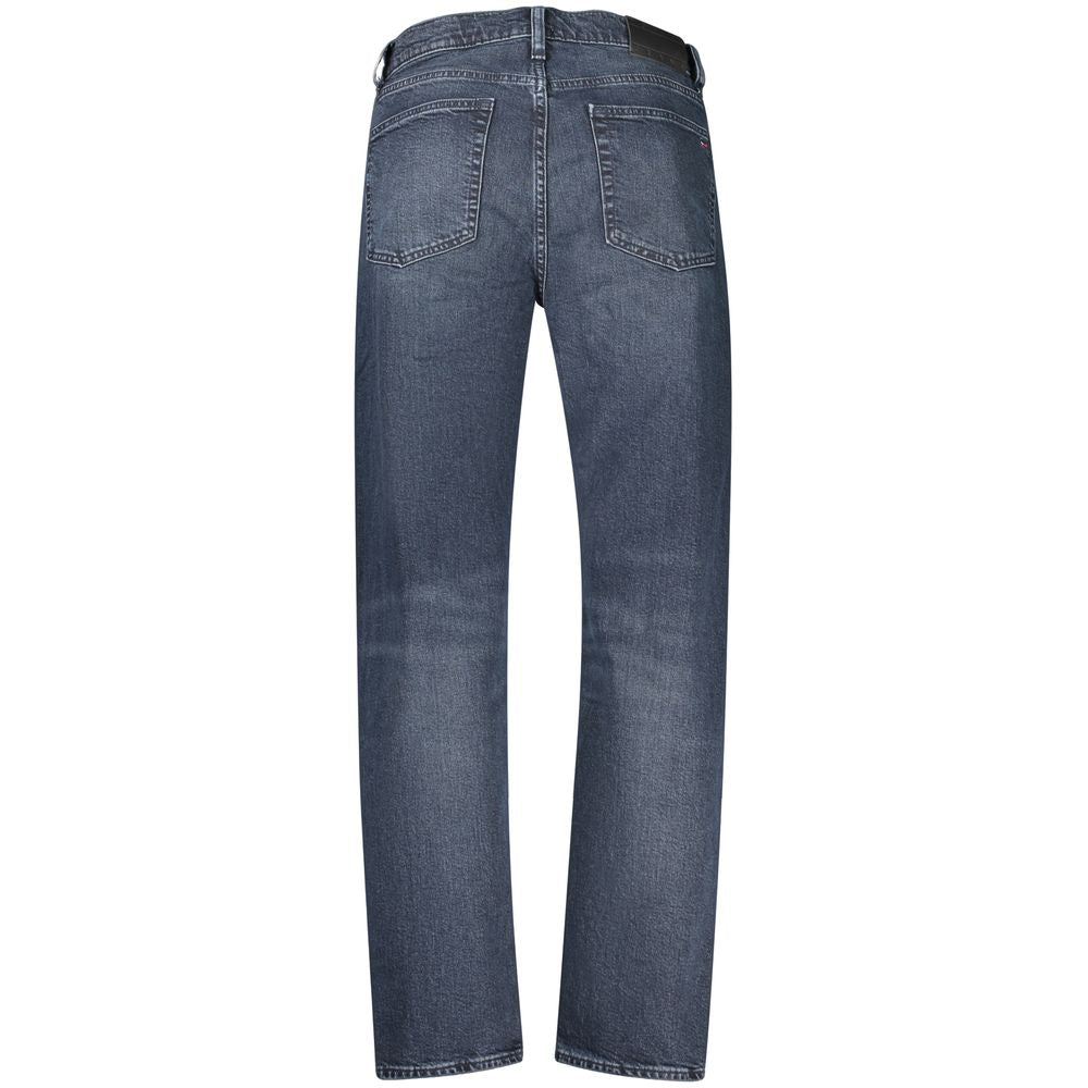 Jeans en coton bleus pour homme de la marque Tommy Hilfiger, coupe classique avec détails modernes.