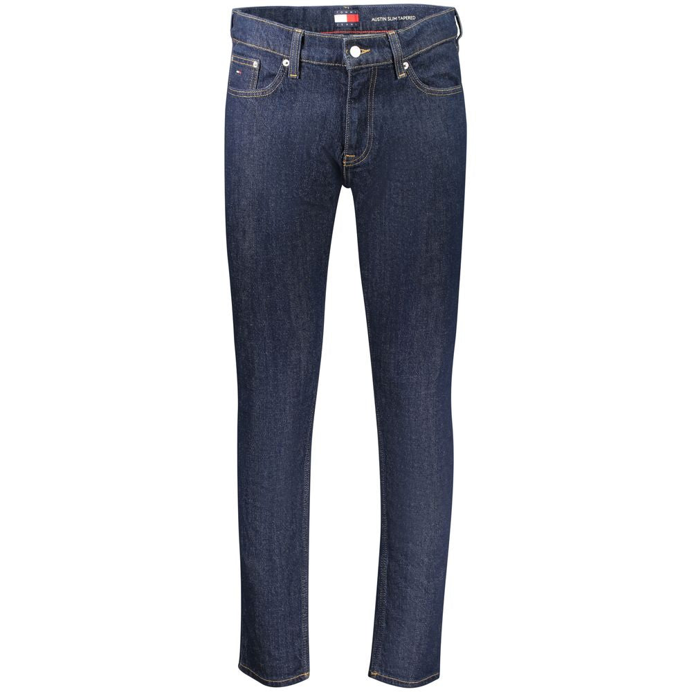 Jean homme slim tapered en coton bleu de la marque Tommy Hilfiger, visible avec détails et poches arrière.