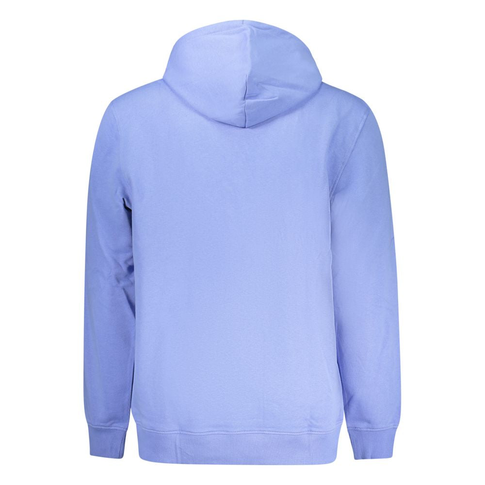 Sweatshirt en coton bleu azur de Tommy Hilfiger pour homme, look décontracté, col rond et logo signature visible.