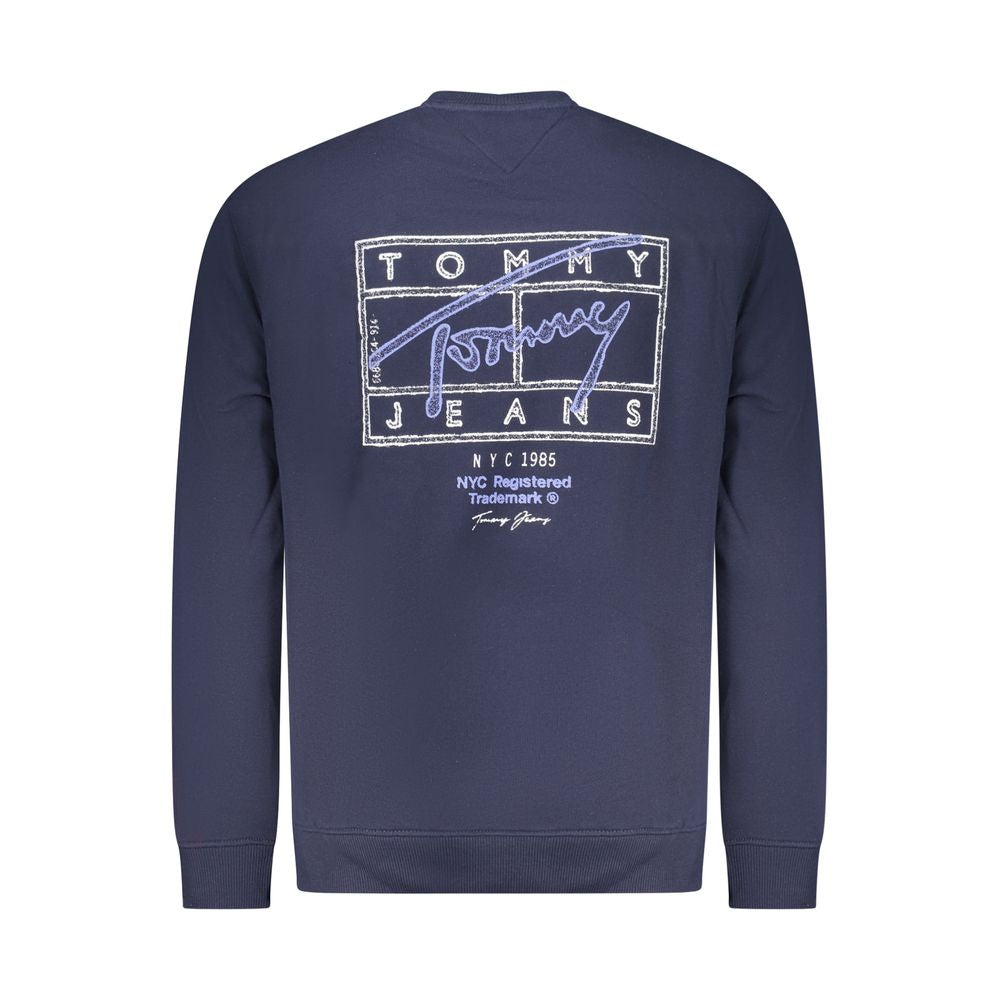 Sweatshirt homme en coton bleu de la marque Tommy Hilfiger, style décontracté avec logo sur la poitrine.