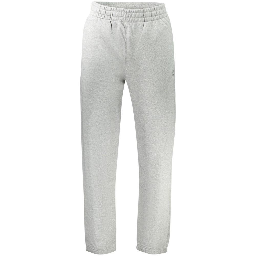 Pantalon de sport pour homme Calvin Klein en coton gris, style décontracté et confortable, image de la paire portée.