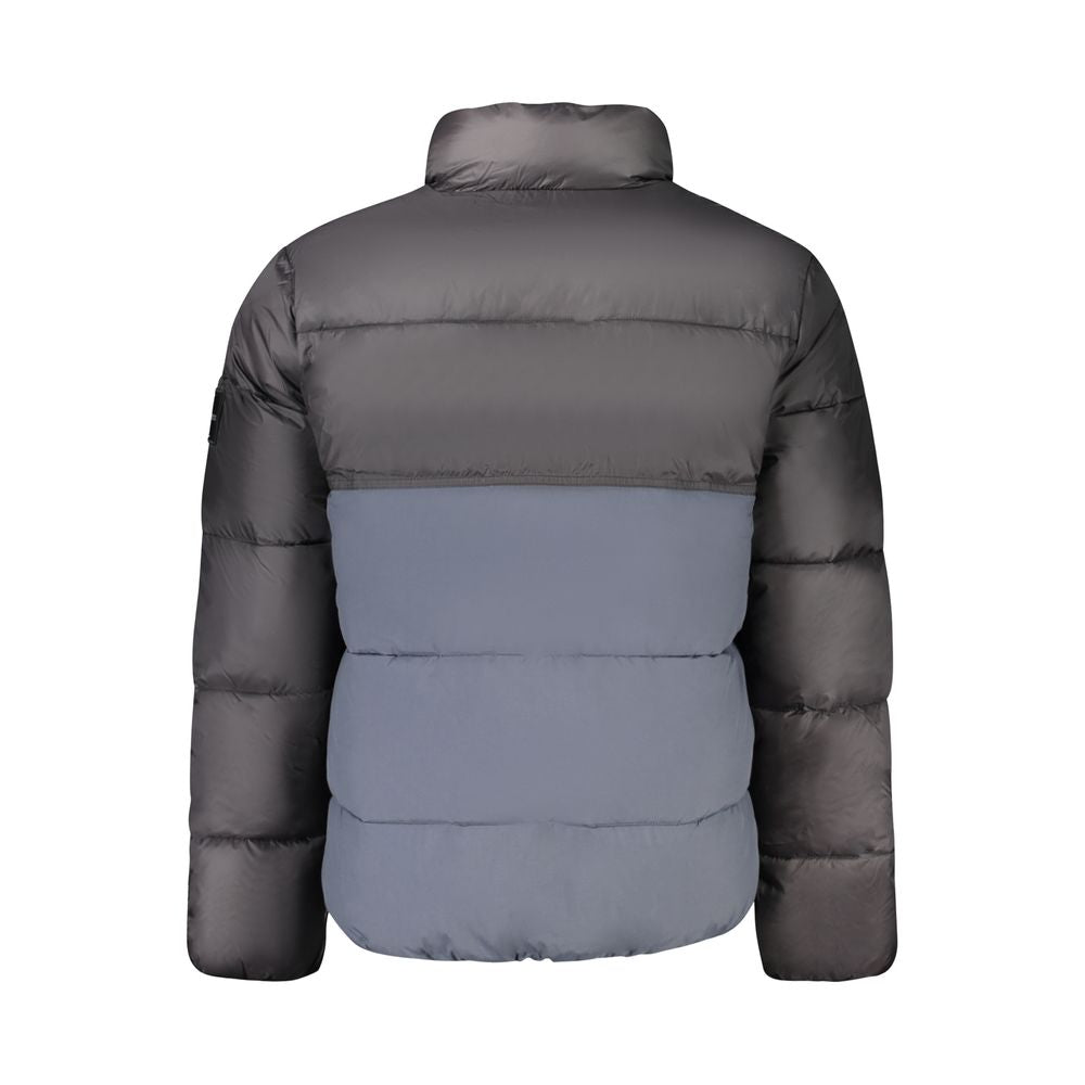 Veste en polyester bleue pour homme de la marque Calvin Klein, avec col et fermeture éclair visible.