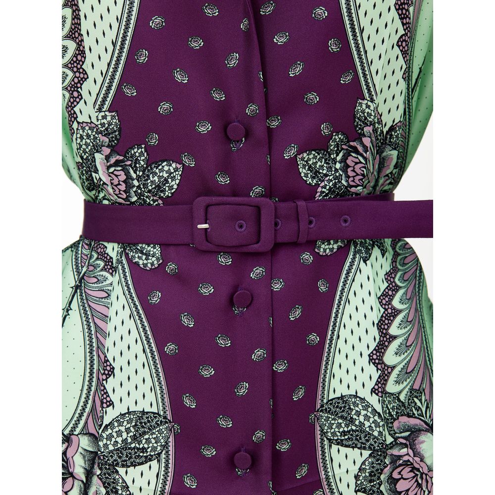 Chemise en soie verte Gucci avec motif élégant, affichant un design sophistiqué et des détails raffinés.