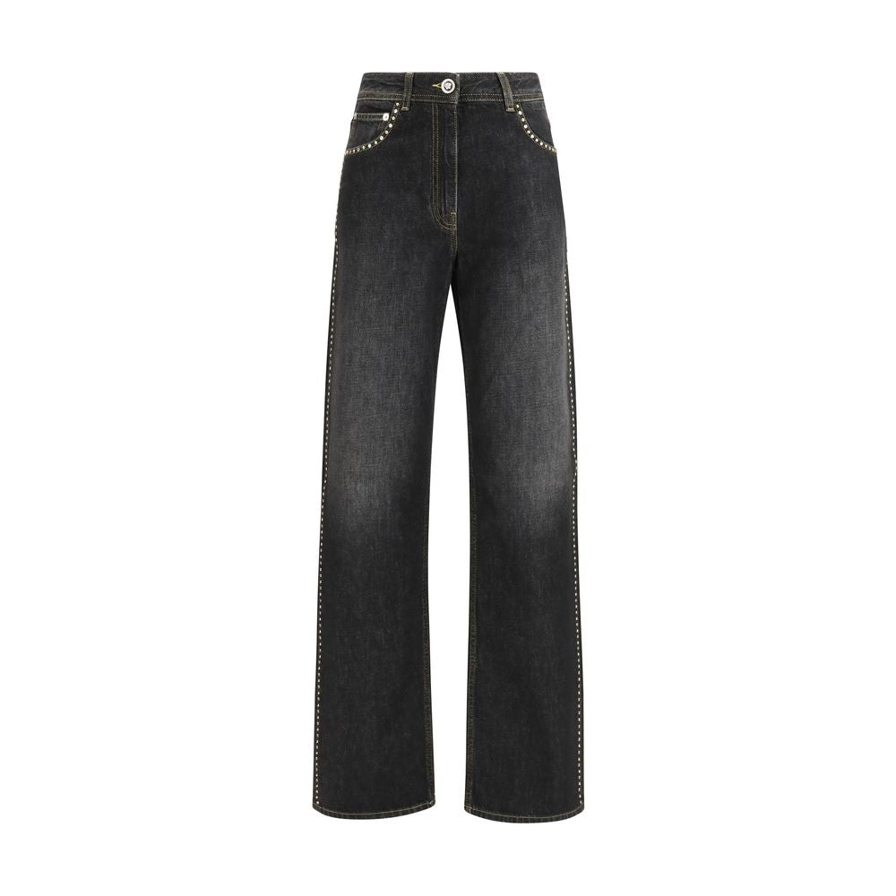 Jeans droits en coton noir de marque Versace, style classique et ajusté, visibles avec détails de couture.