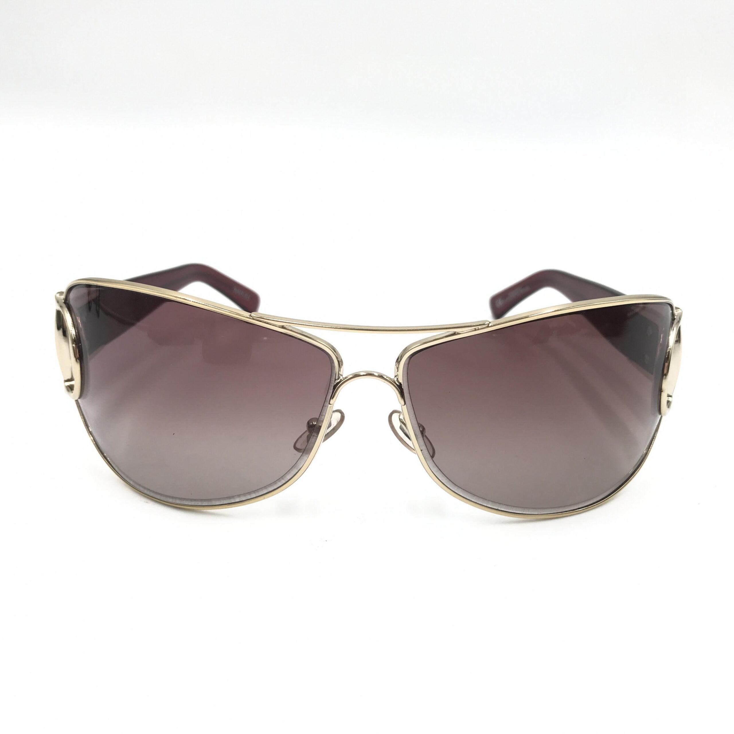 Lunettes de soleil aviator Gucci avec monture en métal et verres teintés, style élégant et classique.