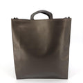 Sac à main en cuir marron Gucci, élégant et sophistiqué, avec détails en cuir et finition de haute qualité.