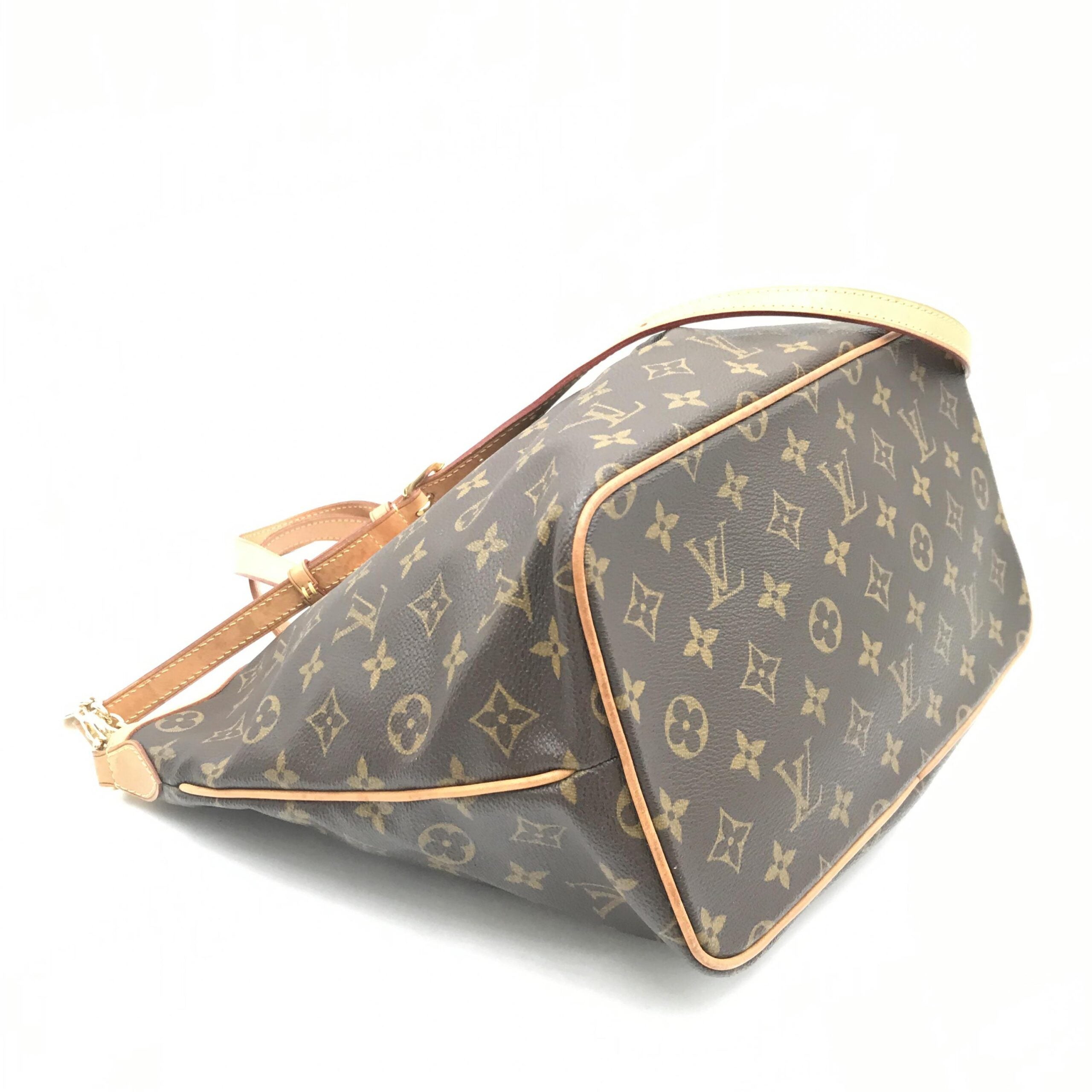 Sac Louis Vuitton Monogram Palermo PM avec poignée en cuir et fermeture métallique, vue de face.