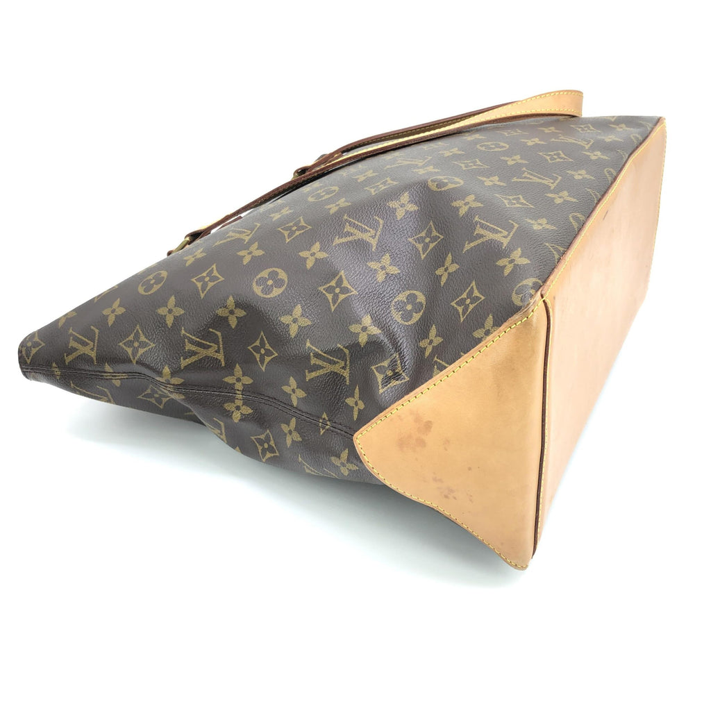 Sac cabas Louis Vuitton Monogram Mezzo, grand sac à main en toile avec motif LV, poignées en cuir et design élégant.