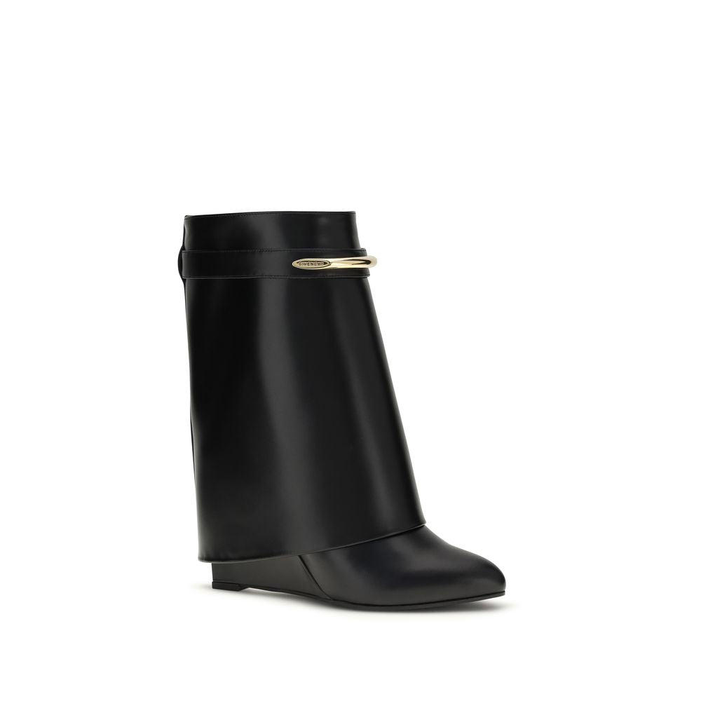 Bottes ankle en cuir de veau noir Givenchy Bos Taurus, style élégant avec semelle en caoutchouc et détail sophistiqué.