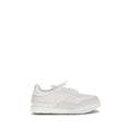 Chaussures basses Givenchy Bos Taurus en cuir de veau blanc, sneakers élégants pour homme avec design moderne.