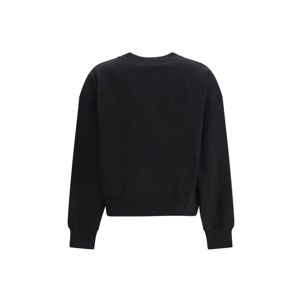 Sweat-shirt noir en coton de Gucci, coupe décontractée, avec logo Gucci sur la poitrine, porté sur un mannequin.