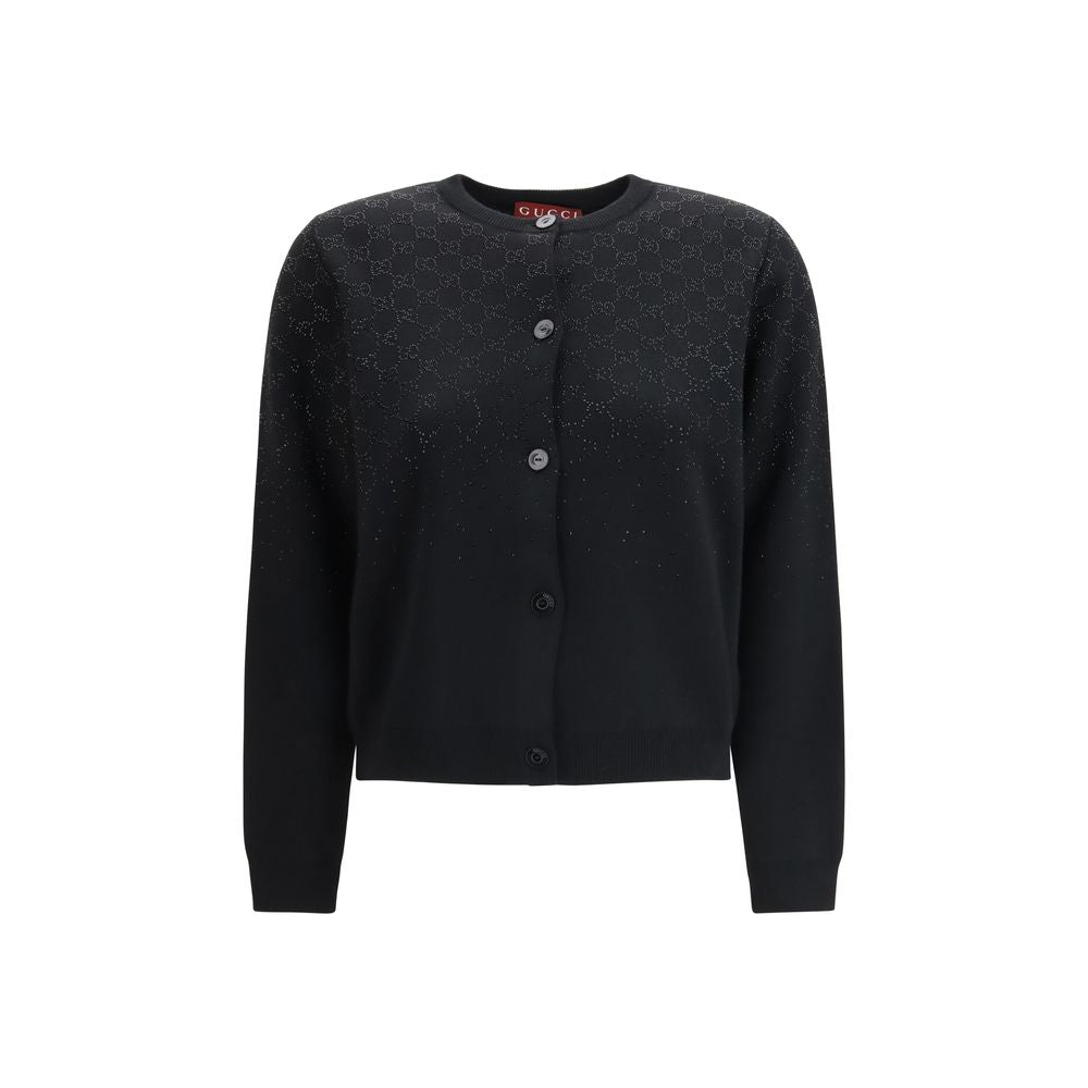 Cardigan en laine noire Gucci, stylé et élégant, avec détails sophistiqués visibles sur l'image.