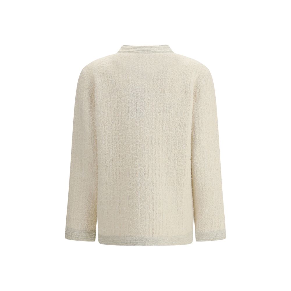 Cardigan en laine beige Gucci pour femme, détail élégant et texture douce visible sur le produit.