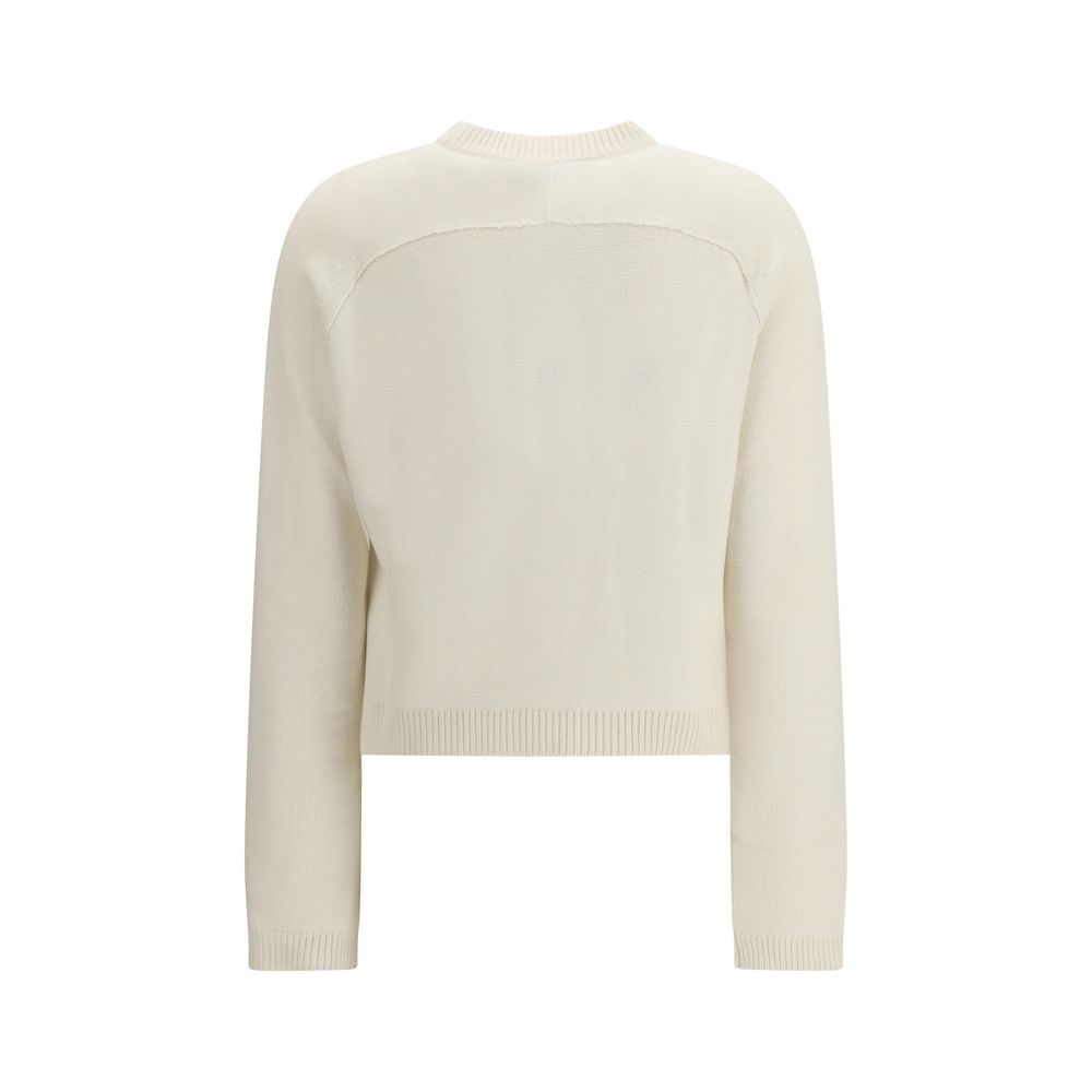 Cardigan en laine beige Gucci pour homme ou femme, finition élégante et texture douce, porté sur un mannequin.