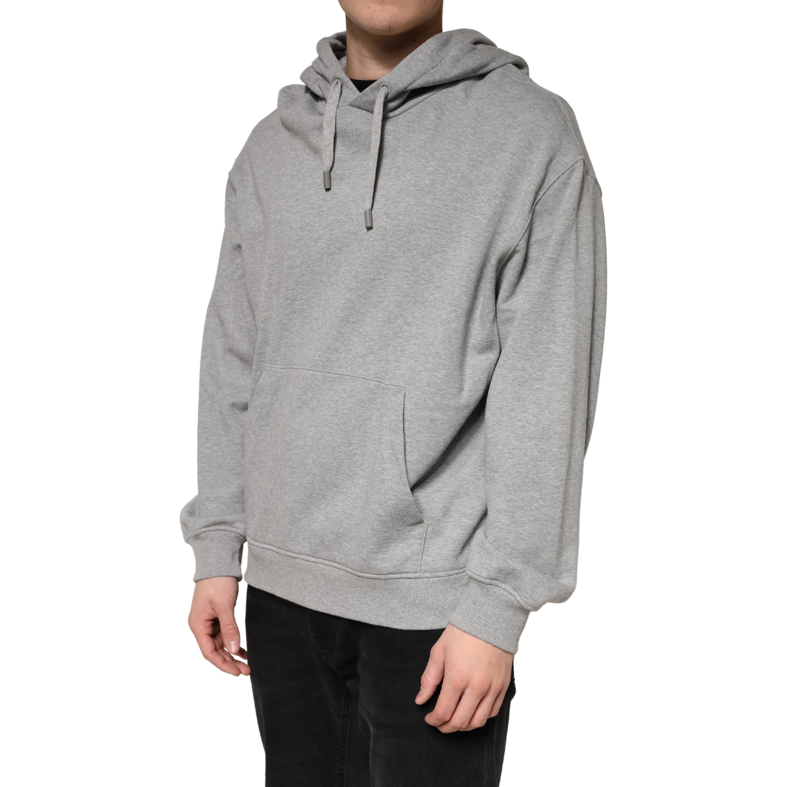 Sweat à capuche en coton gris de la marque Dolce & Gabbana, vue de face, détail du tissu et de la coupe décontractée.