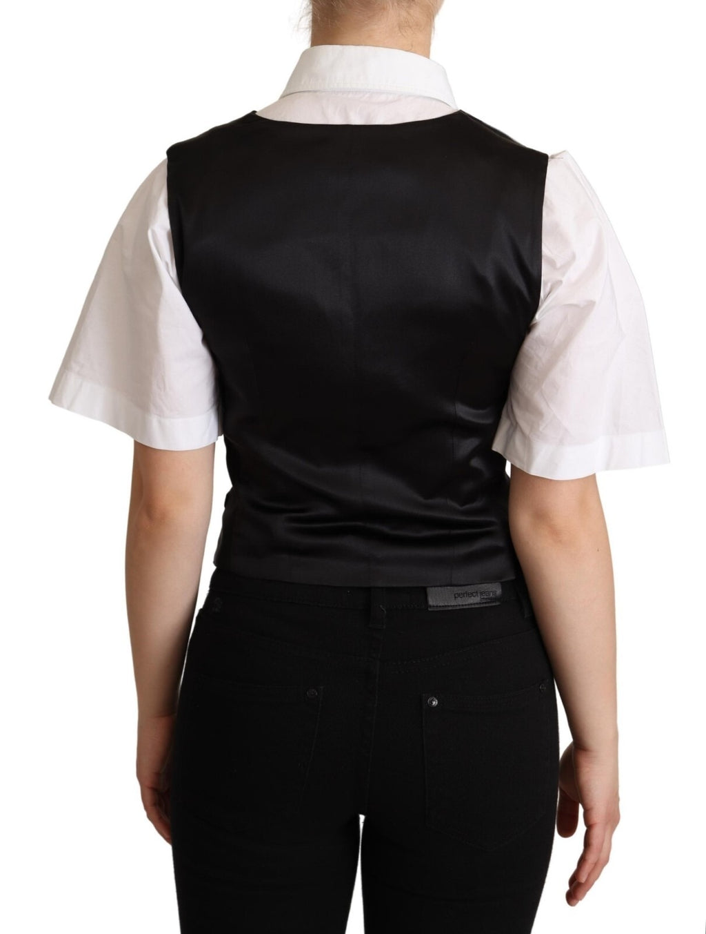Veste sans manches en soie noire solide de Dolce & Gabbana, haut ajusté et élégant, parfait pour une tenue sophistiquée.