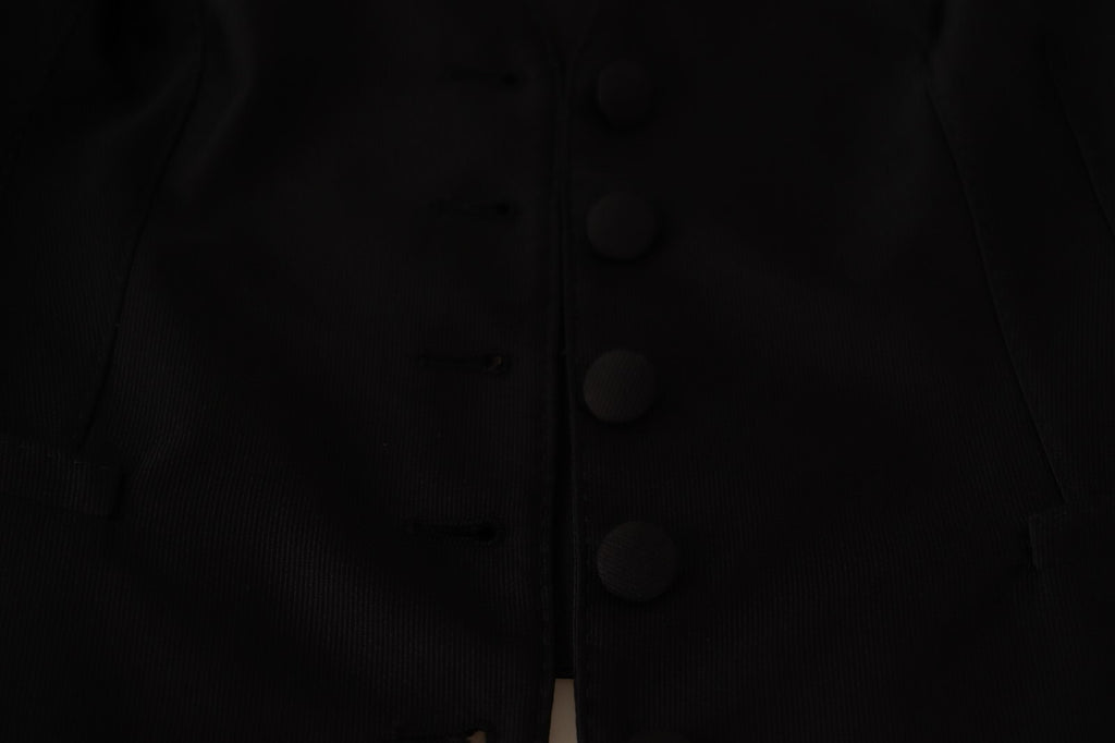 Gilet sans manches en soie noire Dolce & Gabbana, coupe ajustée et élégante, vue de face sur fond neutre.