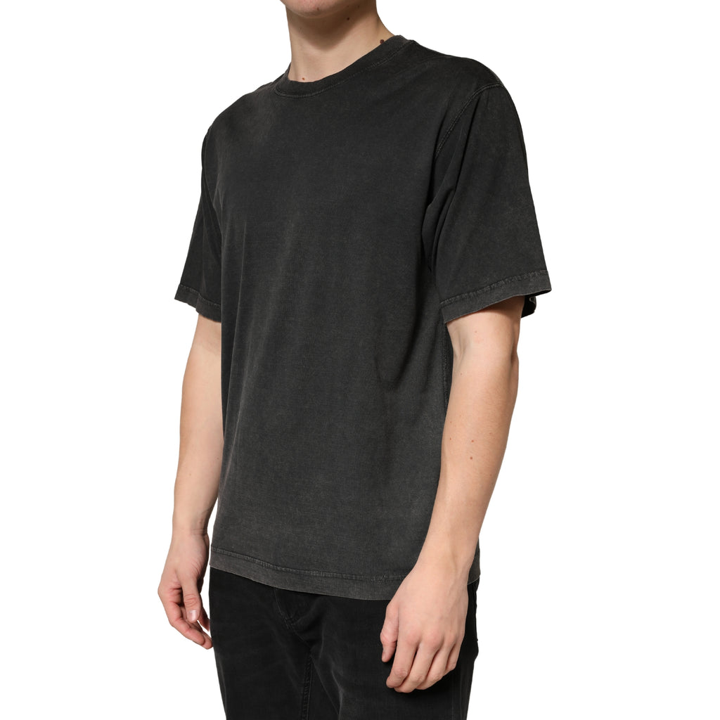 T-shirt noir en coton à col rond à manches courtes de Dolce & Gabbana, vue de face, avec logo discret.