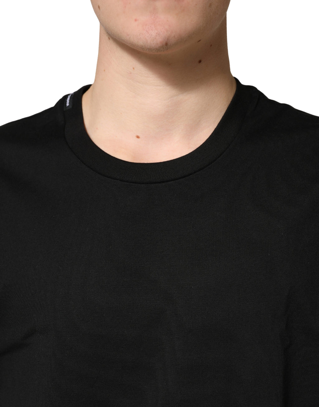 T-shirt noir en coton à col rond et manches courtes de Dolce & Gabbana, vue de face.