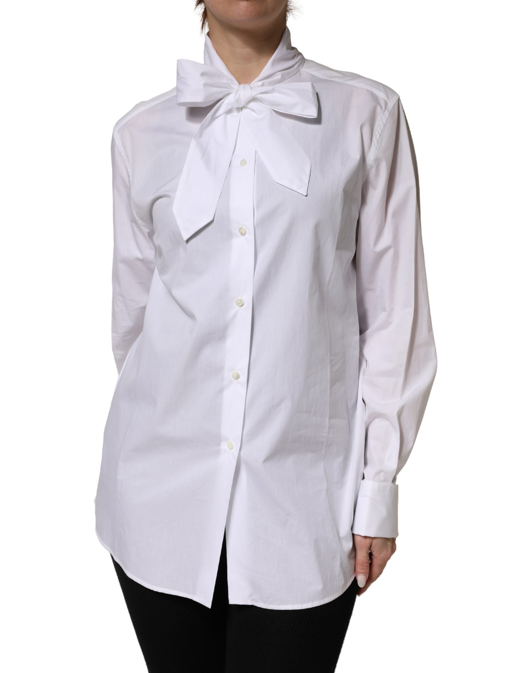 Chemisier blanc Dolce & Gabbana en coton à manches longues avec nœud papillon, élégante et sophistiquée.