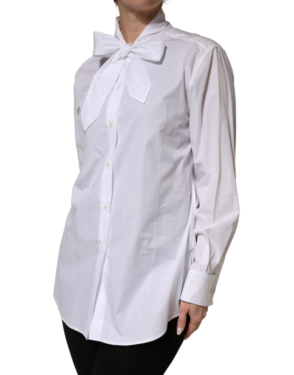 Chemisier blanc Dolce & Gabbana en coton avec manches longues et nœud papillon, élégant et sophistiqué.