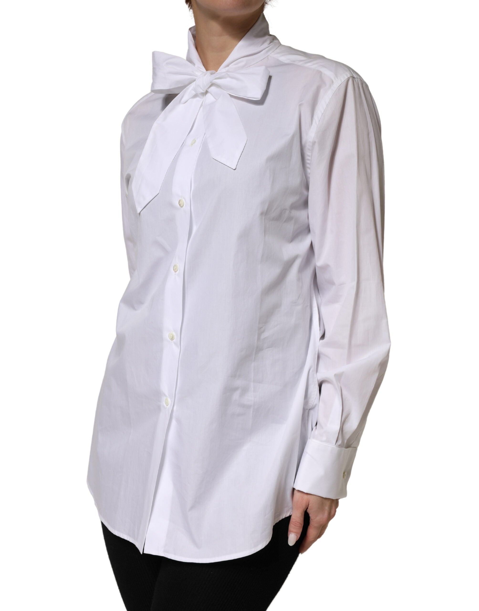 Chemisier blanc Dolce & Gabbana en coton avec manches longues et nœud papillon, élégant et sophistiqué.