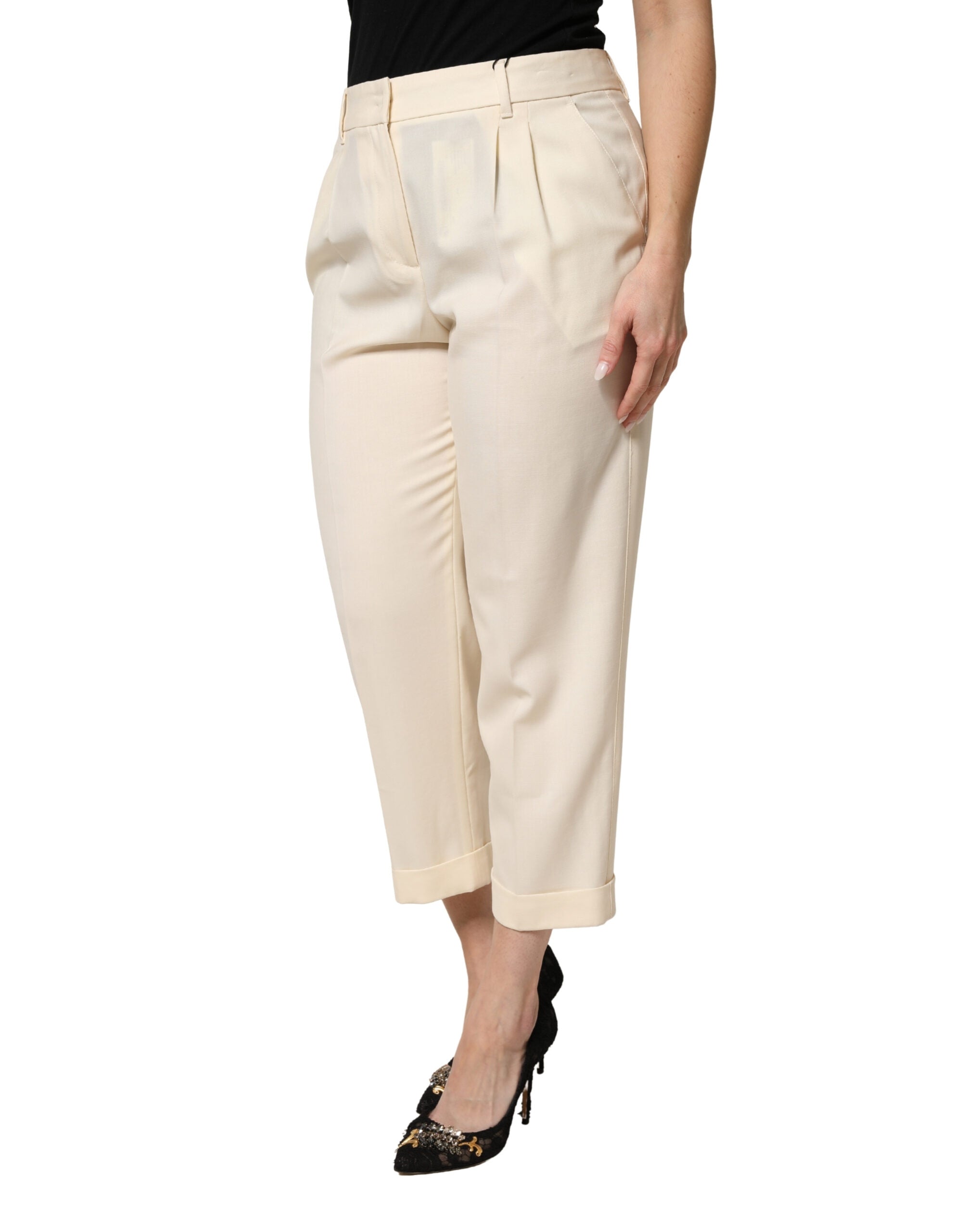 Pantalons cropped en laine ivoire de Dolce & Gabbana, taille moyenne, style chic et élégant.
