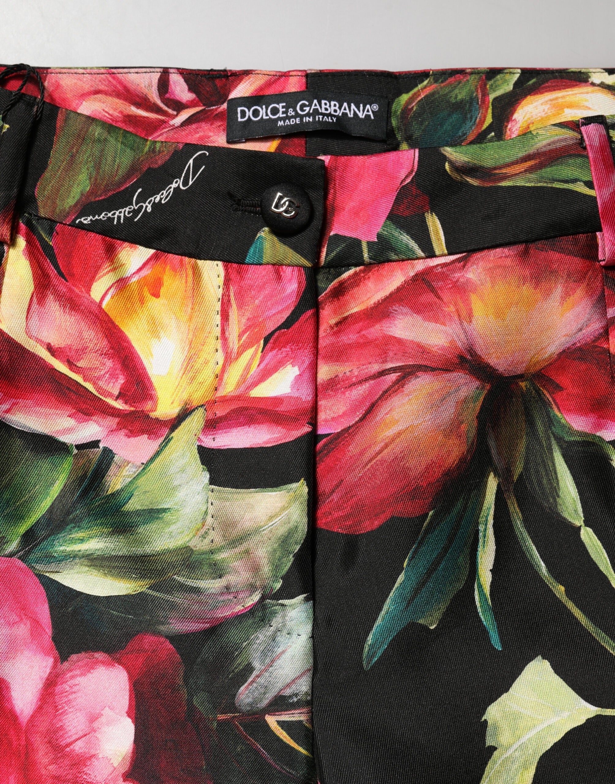 Pantalons Dolce & Gabbana noirs en soie avec motif floral, taille moyenne, coupe Tailored élégante et sophistiquée.