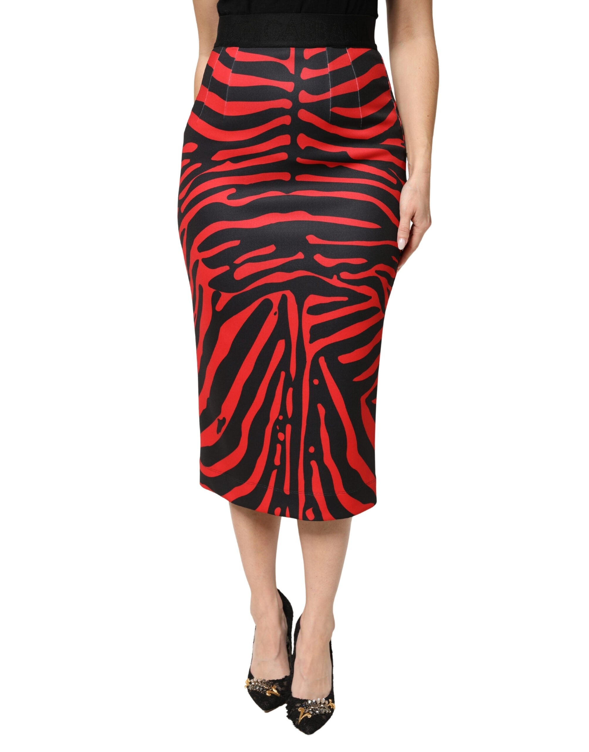 Jupe midi en polyester à imprimé zèbre rouge et noir de Dolce & Gabbana, coupe pencil élégante et tendance.