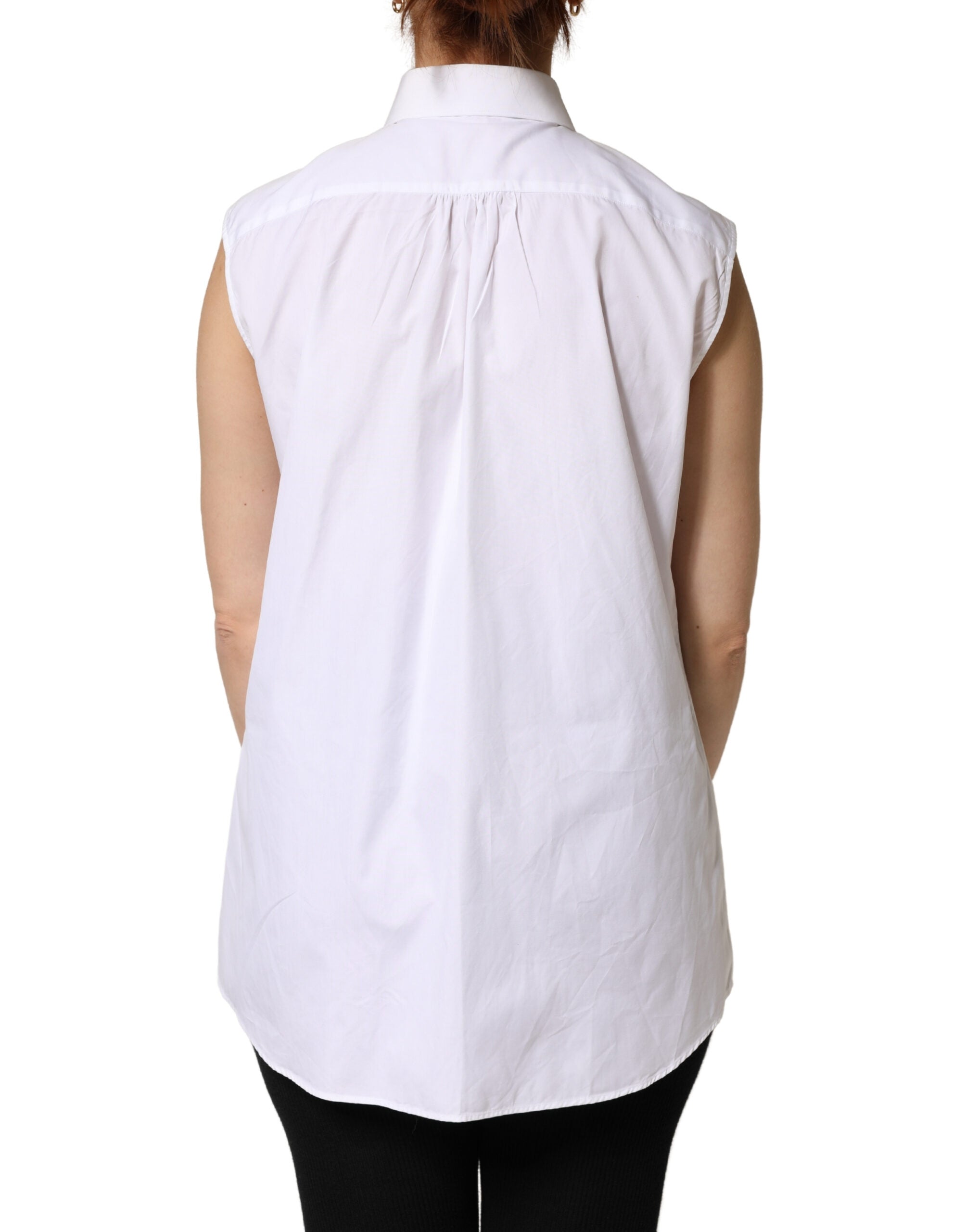 Haut blanc en coton plissé sans manches avec boutons de la marque Dolce & Gabbana, vue de face.