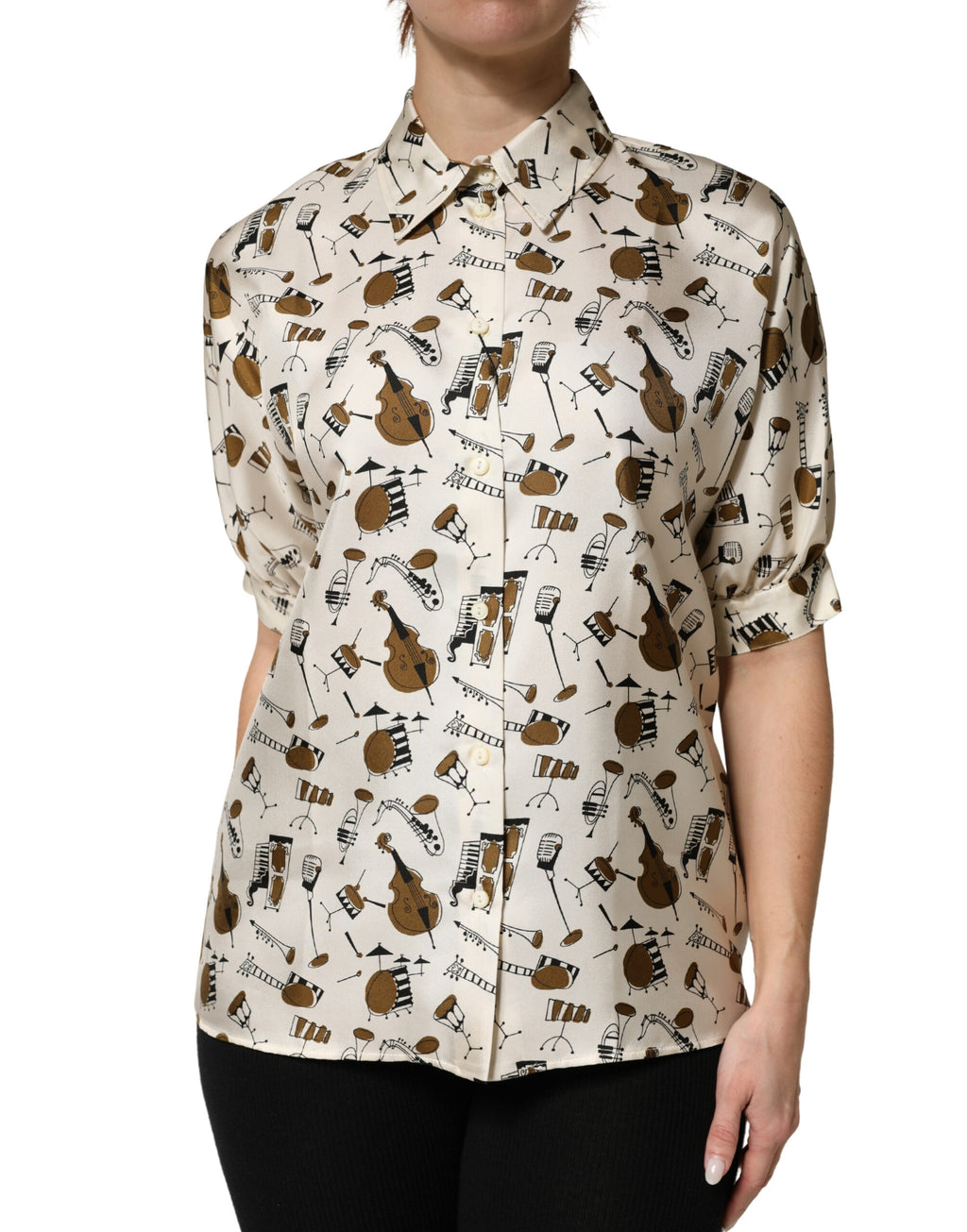 T-shirt beige à manches courtes Dolce & Gabbana avec imprimé d'instruments de musique, style élégant et décontracté.