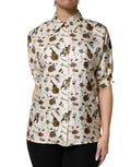 Haut à manches courtes beige Dolce & Gabbana avec motif d'instruments de musique, style élégant et design sophistiqué.