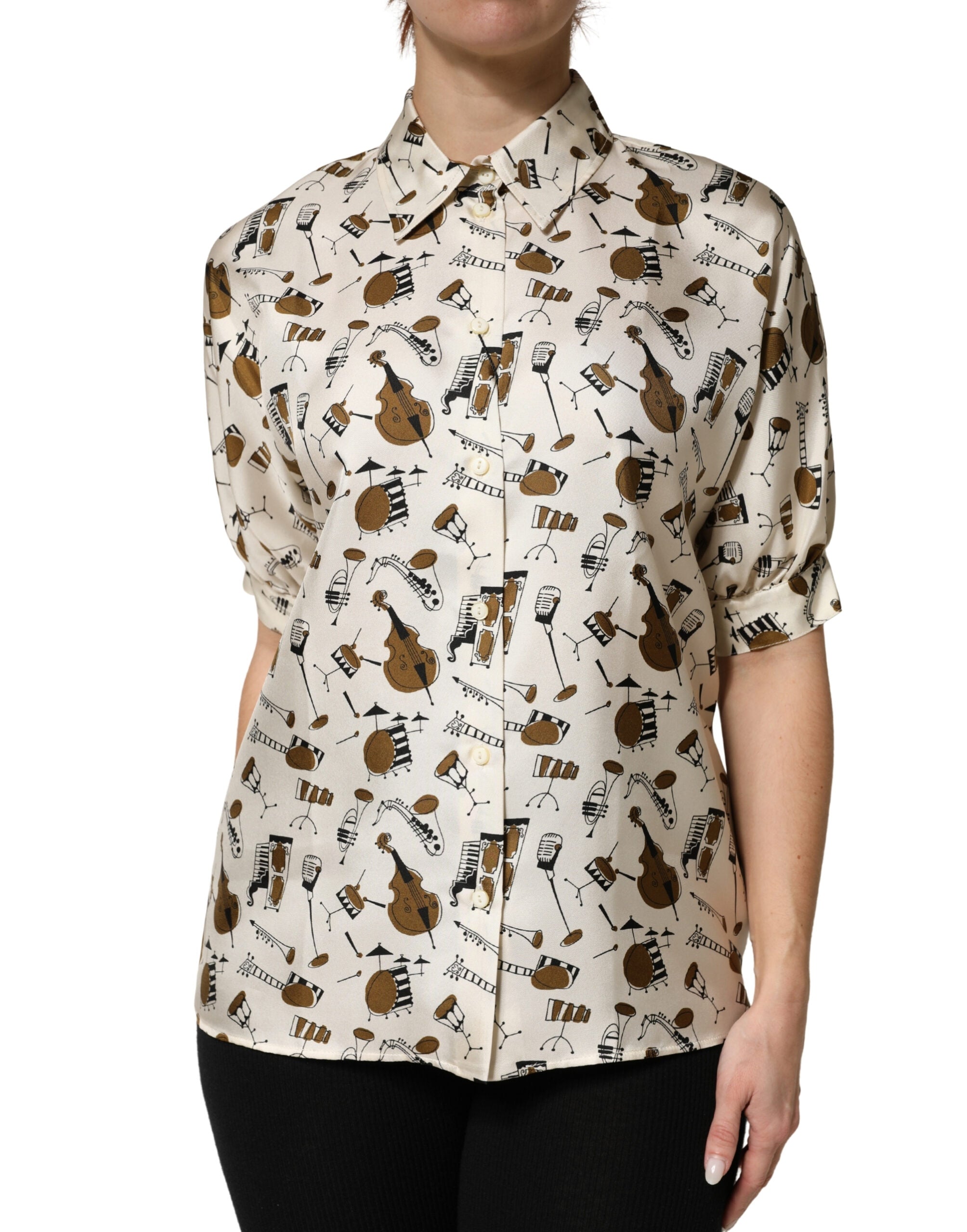 Haut à manches courtes beige Dolce & Gabbana avec motif d'instruments de musique, style élégant et design sophistiqué.