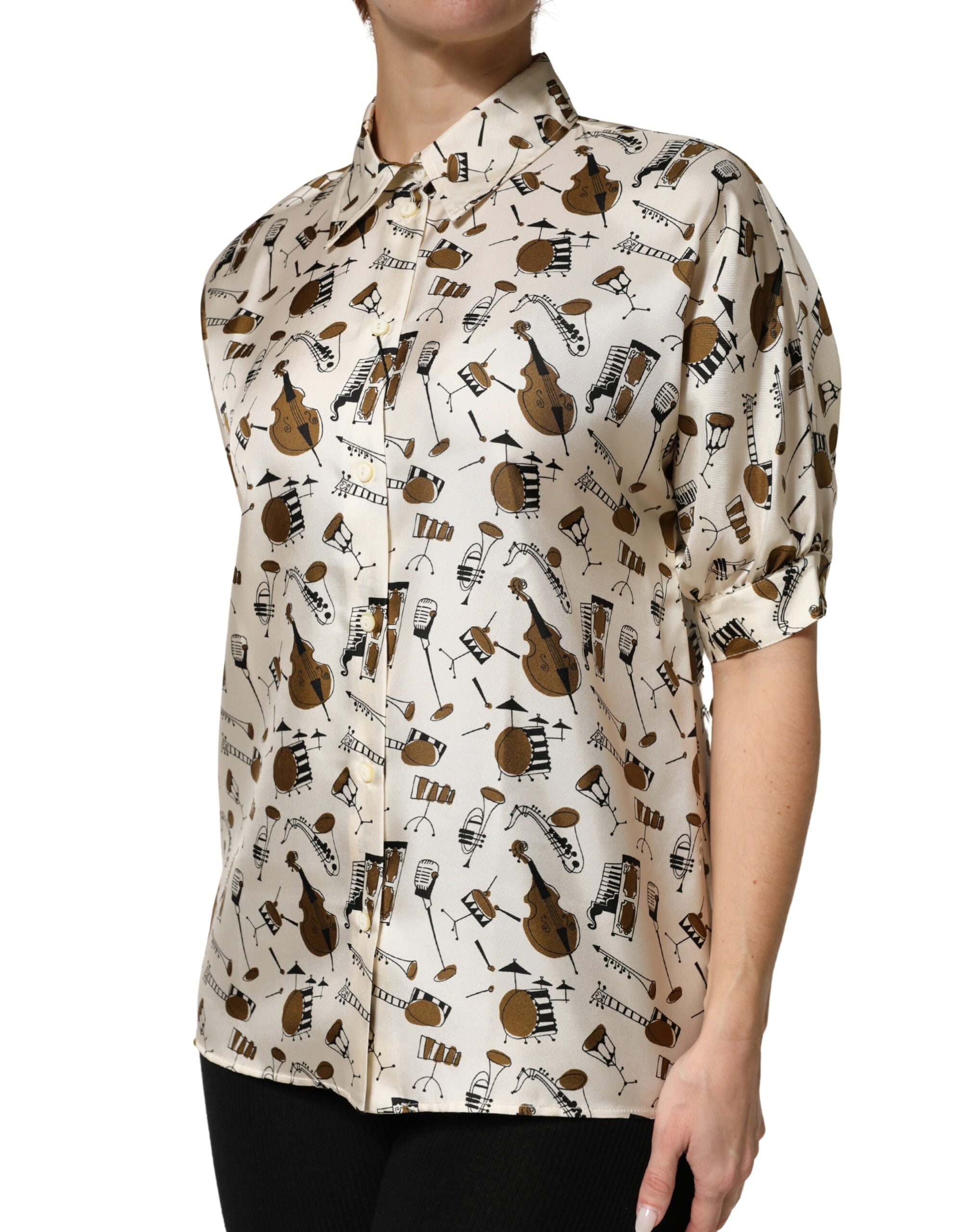T-shirt à manches courtes beige Dolce & Gabbana avec imprimé d'instruments de musique, style élégant et original.