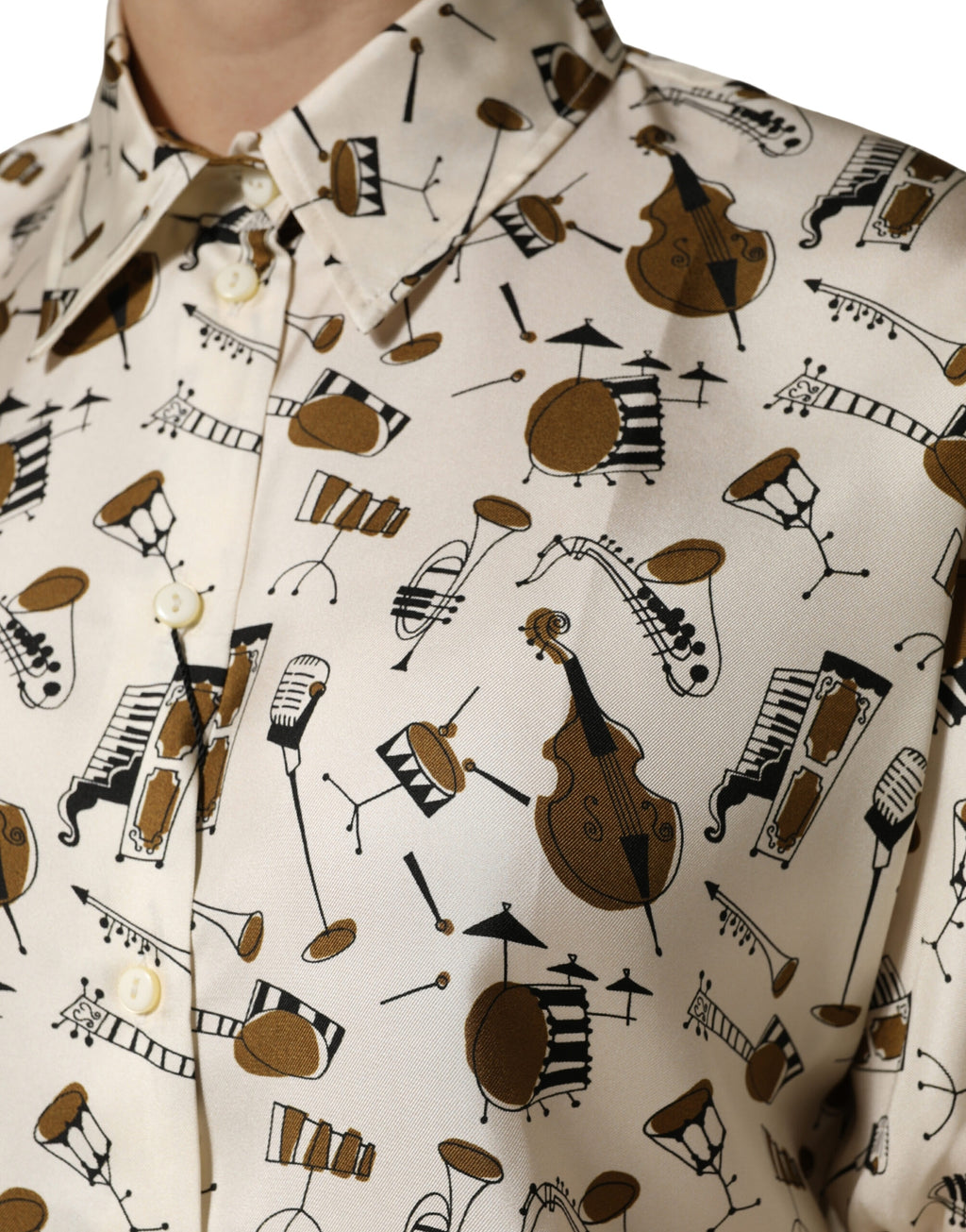 Haut court à manches courtes Dolce & Gabbana beige avec impression d'instrument de musique, style élégant et original.