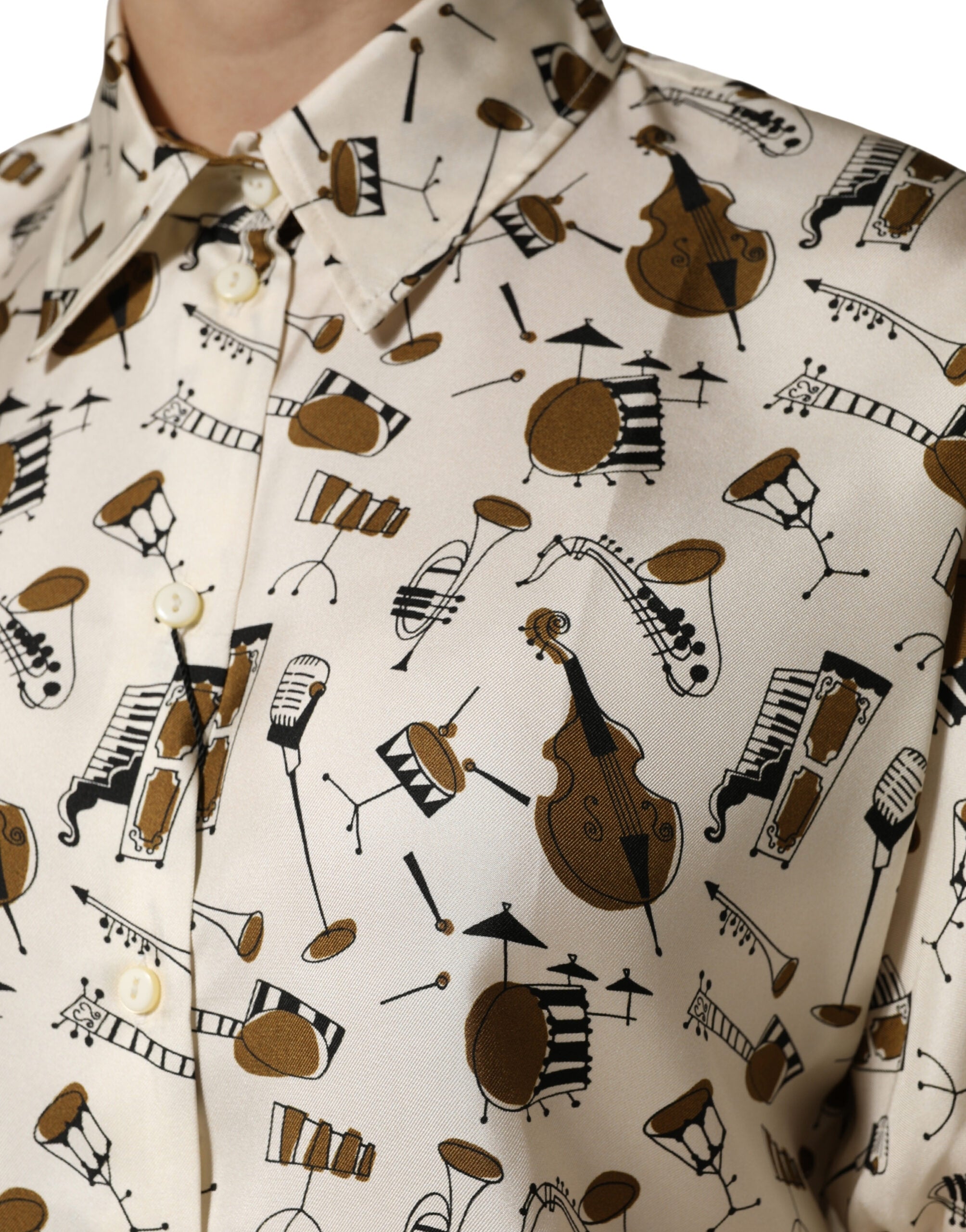 Haut court à manches courtes Dolce & Gabbana beige avec impression d'instrument de musique, style élégant et original.