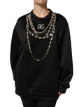 Sweatshirt noir Dolce & Gabbana avec logo orné de cristaux, haut décontracté en tissu élégant et brillant.