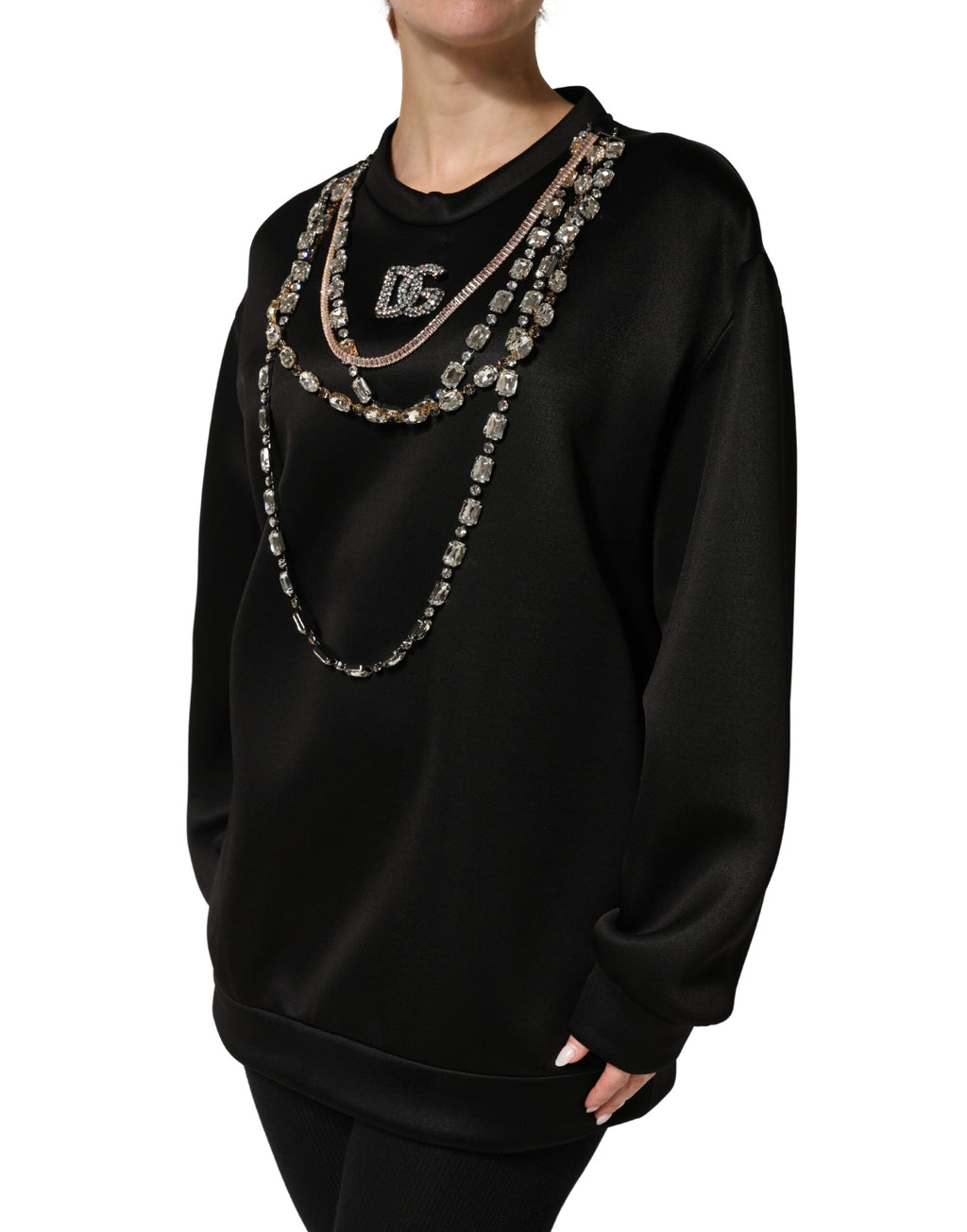 Sweatshirt noir Dolce & Gabbana avec logo orné de cristaux brillants, style élégant et moderne.