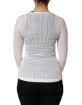 Cardigan en soie blanche en dentelle avec manches longues de Dolce & Gabbana, élégant et sophistiqué.
